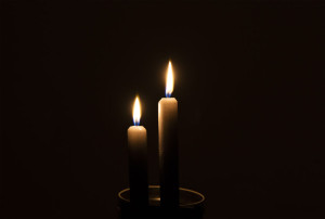 55773869 - two candles in the dark